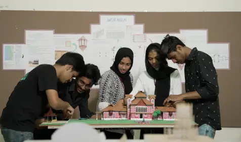 Students interacting and utilizing the advanced architectural facilities in the architectural departmen